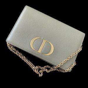 Dior clutch bag, silver color with gold chain